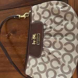 Tan & Brown Small coach purse.